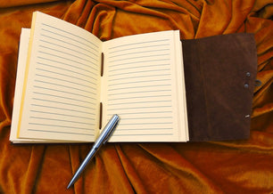 Handcrafted C lock journal with handmade recycle parchment paper